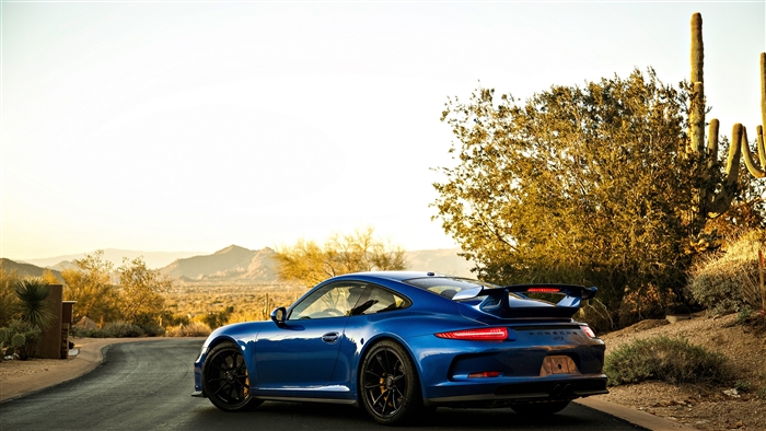 Blue Porsche 911 GT3 in a Desert Landscape