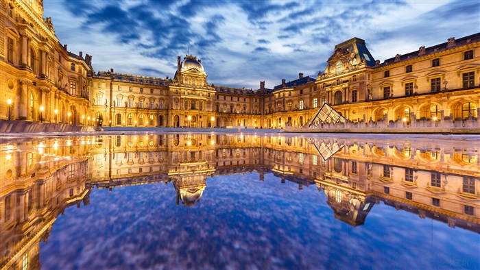 The Louvre Museum at Night with Reflection