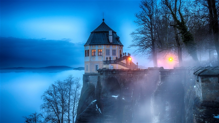 Foggy Fortress on a Cliffside at Dusk