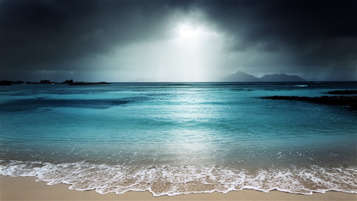 Beach with Turquoise Water and Stormy Sky 4K