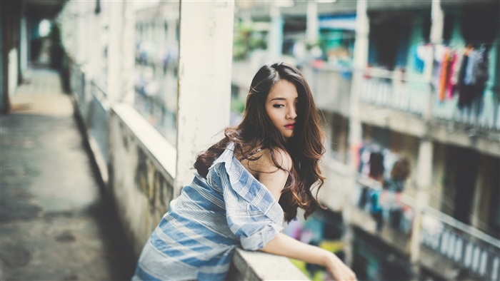 Young woman on a balcony