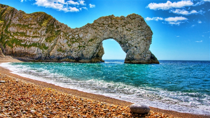 Durdle Door Arch Rock Formation on Beach