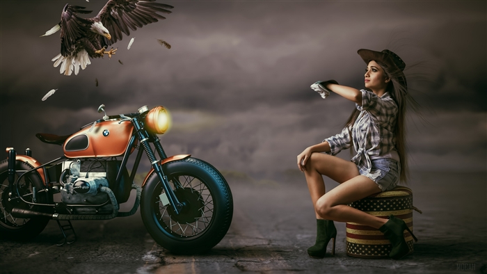 Woman in Cowboy Hat and BMW Motorcycle with Eagle