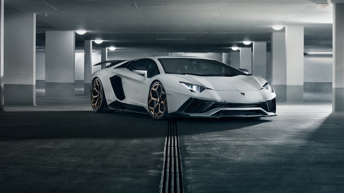 White Lamborghini Aventador in parking garage