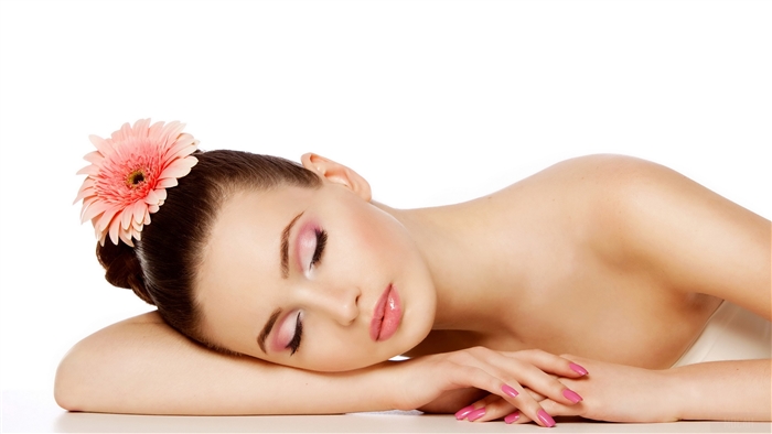 Peaceful Sleeping Woman with Pink Gerbera Flower