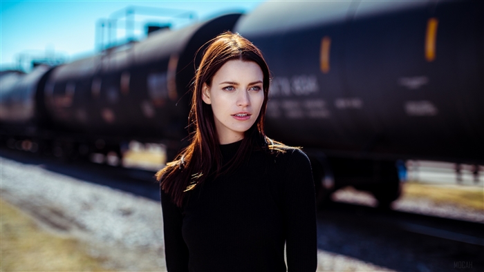 Brunette Woman with Blue Eyes by Train 4k