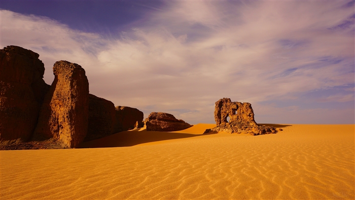 Desert landscape with rock formations and sand dunes in Algeria 4K