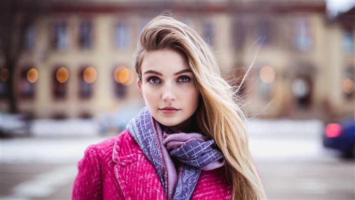 Woman with Blonde Hair and Blue Eyes Wearing Scarf