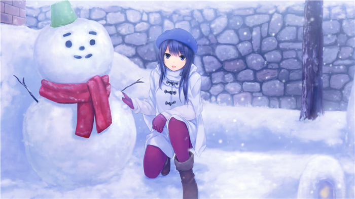 Girl building a snowman in winter