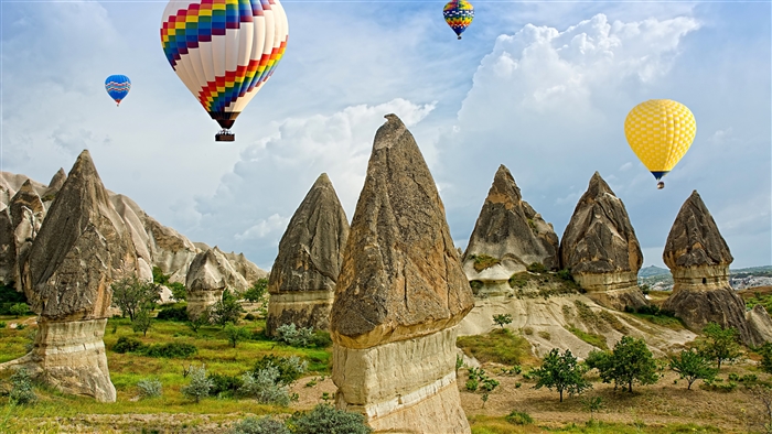 Hot Air Balloons Over Cappadocia Rock Formations 4K