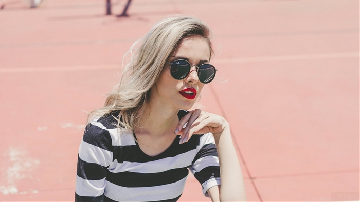 Woman with Blonde Hair and Sunglasses Wearing Striped Shirt 4K