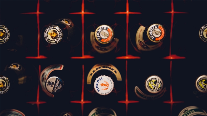 Beer bottle caps in a rack