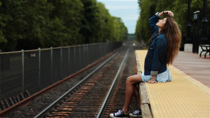 Girl on train platform