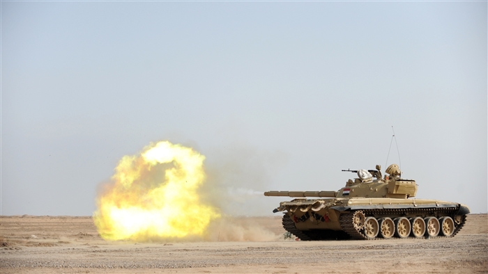 Tank firing in desert