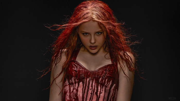 Woman with red hair and bloody dress