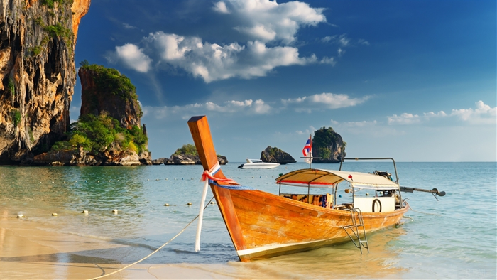 Longtail boat on a beach in Thailand 4K