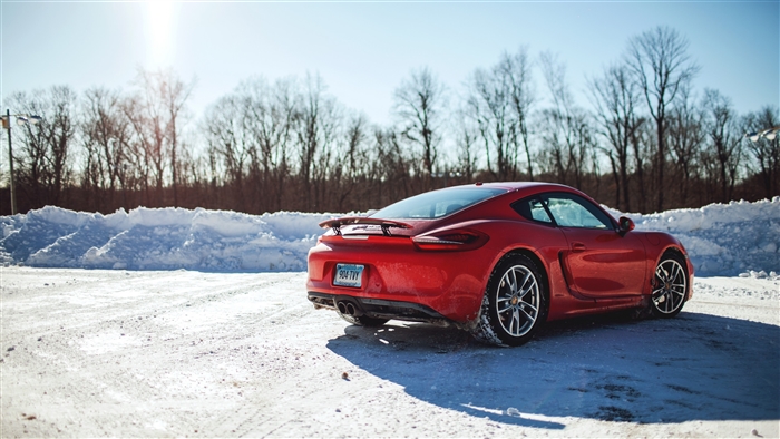 Red Porsche Cayman S in Snow 4K