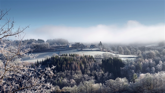 Winter landscape with a village in France
