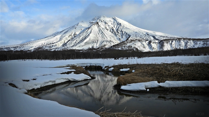 Snow-covered Volcano and River in Winter