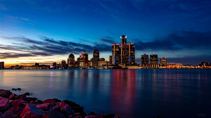 Detroit skyline at dusk over the river