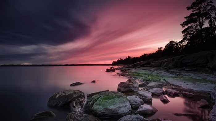 Rocky Shoreline at Sunset with Pink Clouds