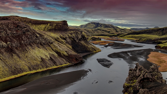 River landscape with mountains and dramatic sky 4K