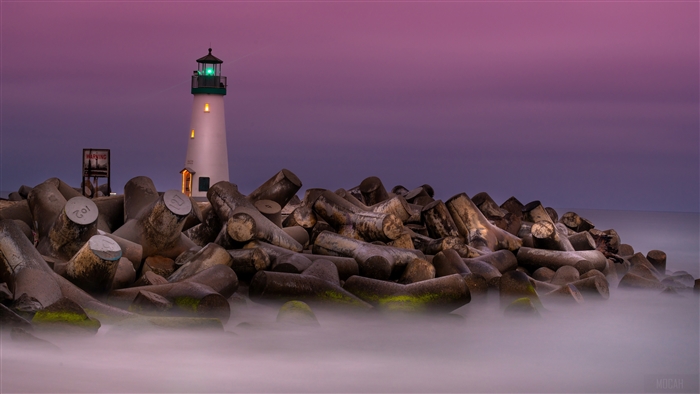 Lighthouse and Rocks at Twilight 4k