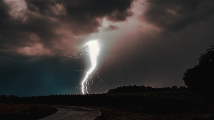 Striking Lightning Bolt in Dark Stormy Night