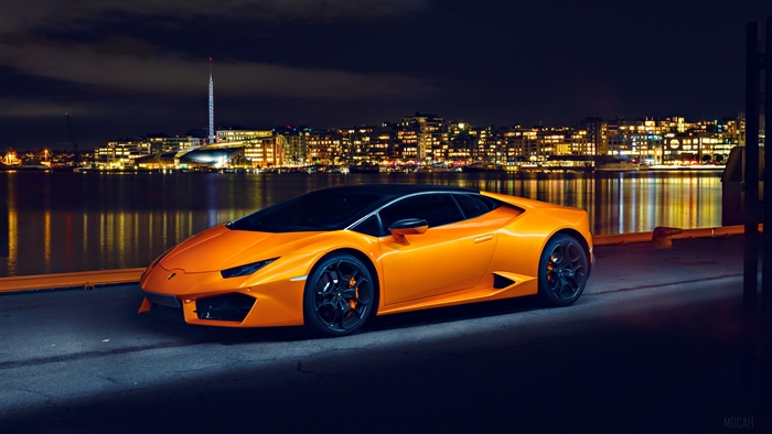 Orange Lamborghini Huracan Sports Car at Night