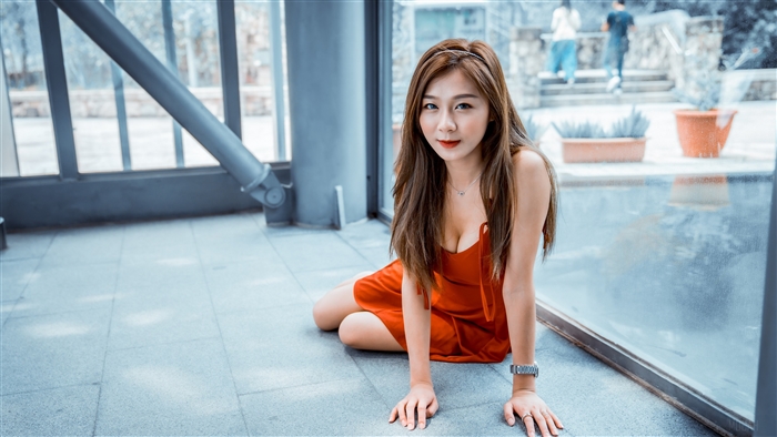 Brunette Woman in Red Dress Sitting Near Window 4K