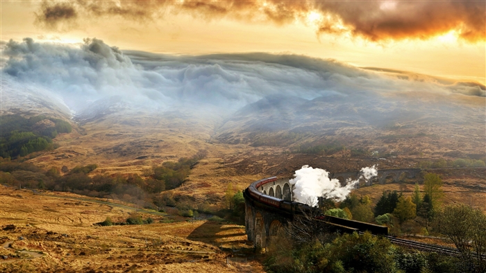 Train on Viaduct in Misty Mountains 4K