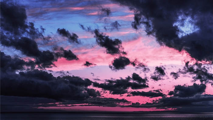 Dark Clouds Over Ocean at Sunset 4K