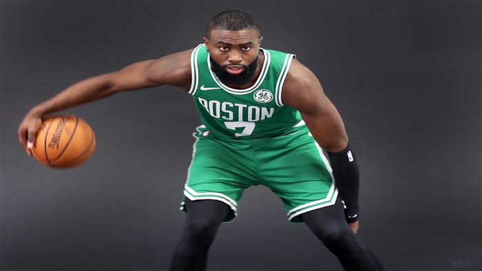 Jaylen Brown from Boston Celtics dribbling a basketball