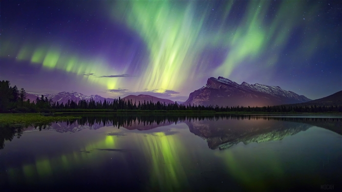 Aurora Borealis over Mountains and Lake Reflection 4K