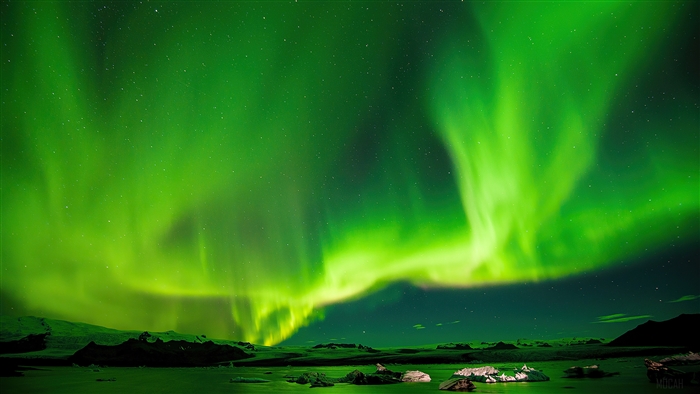 Green Aurora Borealis over a Landscape