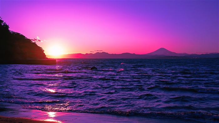 Purple Sunset Over Ocean with Mountain