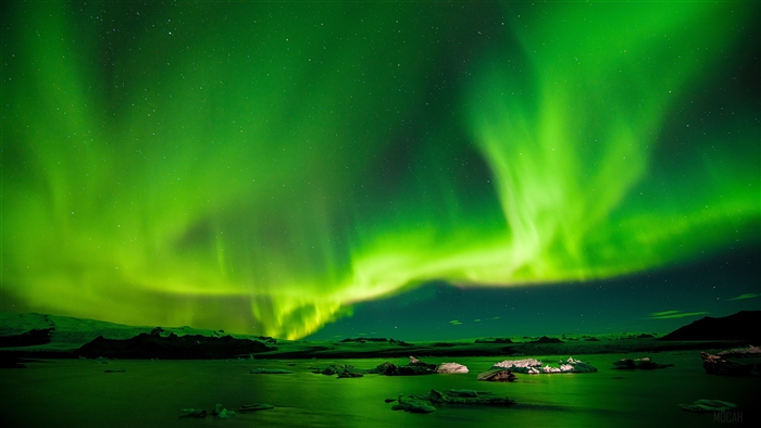 Aurora Borealis over a glacial lake