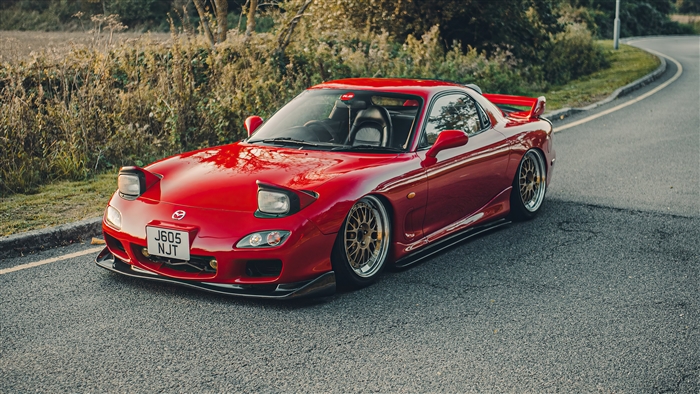 Red Mazda RX7 in Natural Setting 4K