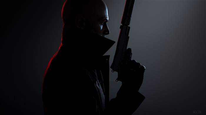 Agent 47 from Hitman 3 holding a silenced pistol