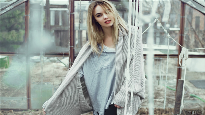Blonde woman in sweater 4K