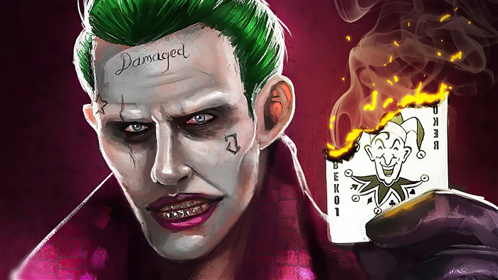 Joker holding a burning Joker card