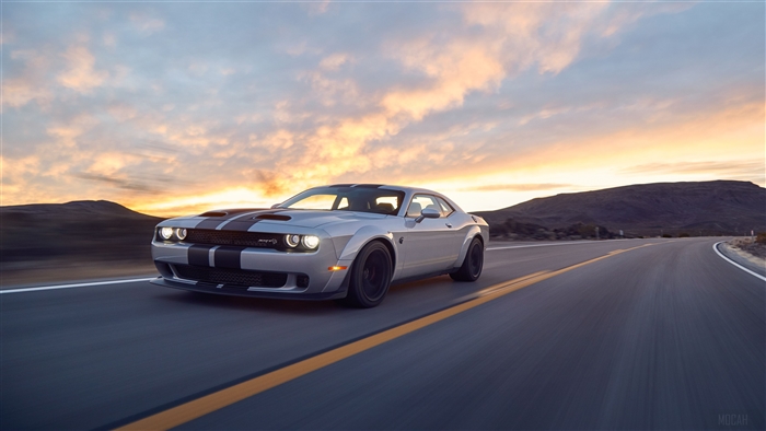 Silver Dodge Challenger Hellcat SRT on a Desert Road