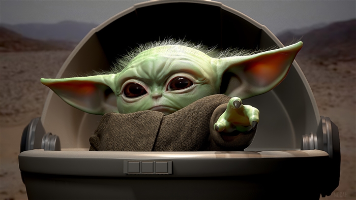 Baby Yoda from Star Wars in a hover pram