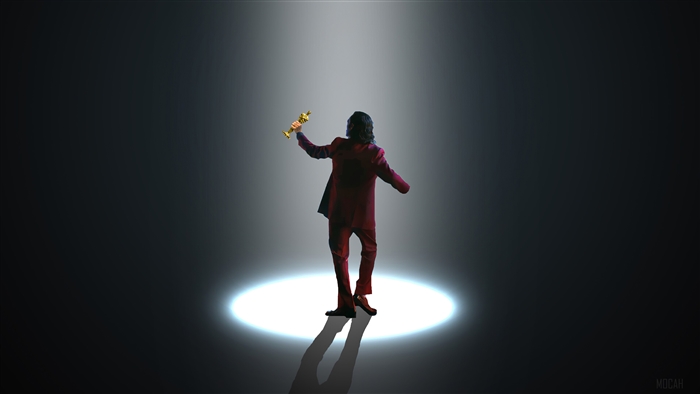 Joker holding an Oscar award