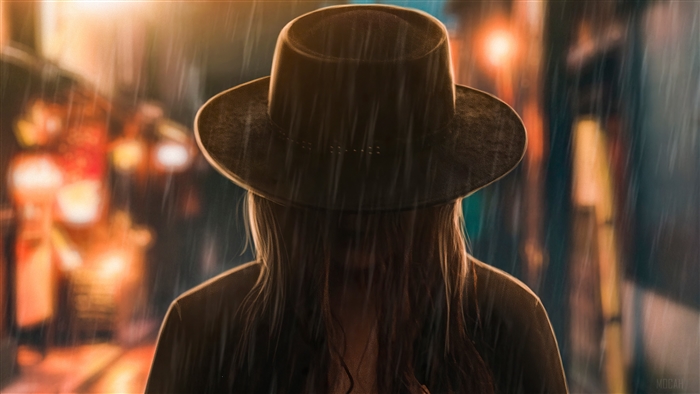 Person in Hat in Rain