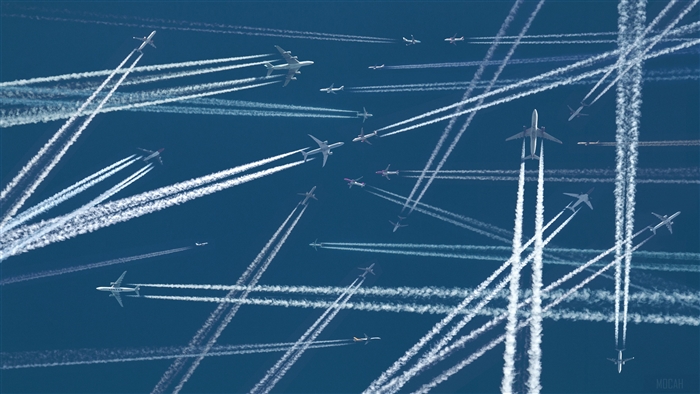 Planes leaving contrails in the sky 4K