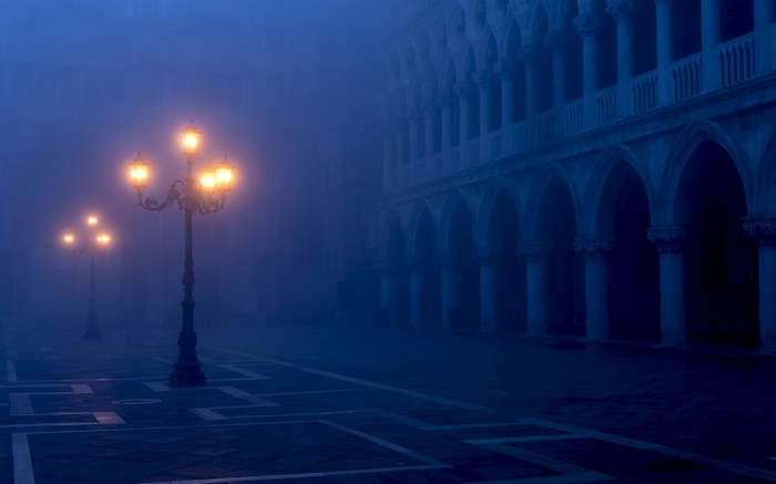 Foggy Evening in Venice Piazza with Glowing Lamps