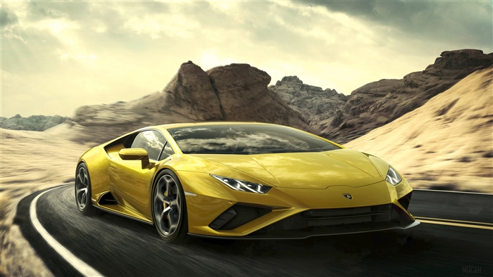 Yellow Lamborghini Huracan EVO RWD driving on a road