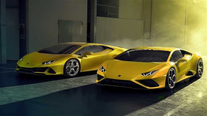 Two yellow Lamborghini Huracan EVO RWD 2020 cars