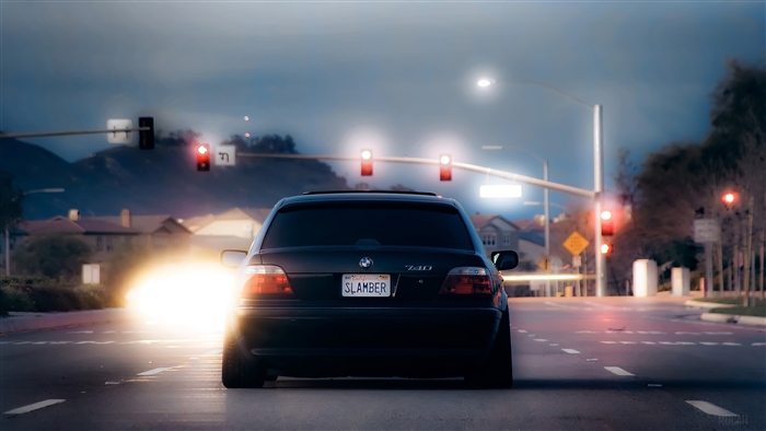Black BMW 740 at Night